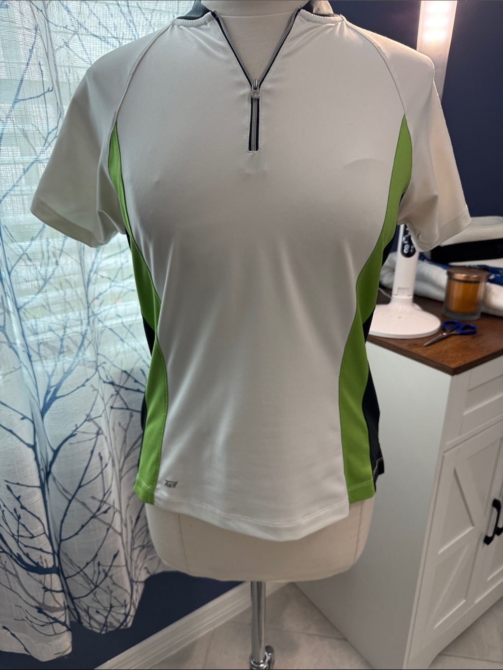 Tail - Women’s White and Green Performance Zip-Front Top